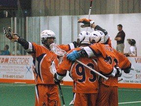 The Six Nations Arrows celebrate after Randy Staats' first goal of the game against the Brampton Excelsiors Sunday during Ontario Junior A Lacrosse League action Sunday at the Iroquois Lacrosse Arena. (DARRYL G. SMART Brantford Expositor)