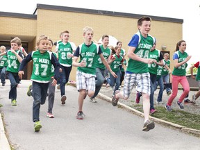 Among those students old enough to compete in track-and-field events at St. Mary Catholic School, an astounding 80% do so. (Meghan Balogh QMI Agency)