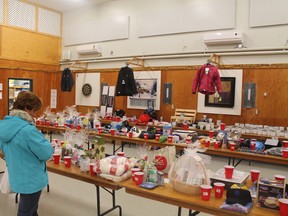 Connaught residents took part in a welcome change of pace over the weekend as they enjoyed a penny sale at the Community Centre. The funds raised from the event will go towards increased programming and repairs to the facility to ensure that the children of Connaught never lack for something to do. Louise Carriere surveyed the variety of items available for auction.