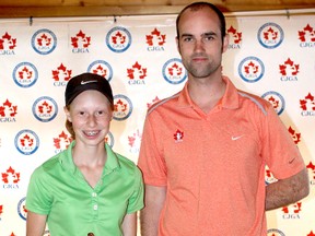 Timmins native Sydney Lia accepts her second place trophy from a Canadian Junior Golf Association representative at the CJGA tournament held at Pheasant Run Golf Club in Newmarket this past weekend. Lia lost in a playoff to King City’s Melissa Ramnauth.