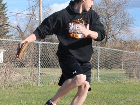 Jared Henderson of the MUCC Track Team tried his hand at discus during the mini-meet at Brownridge Field in Tisdale on Tuesday, May 14.