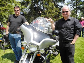 SARAH DOKTOR Times-Reformer
Steve Bergen of Port Rowan and Brian Seeley of Port Rowan were among dozens of motorcyclists to take part in the Blessing of the Bikes service at St. Andrew's United Church in Vittoria on Sunday.