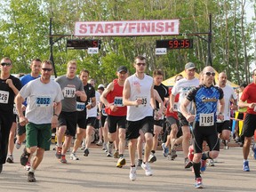 Half-marathon and 10 kilometre runners leave the starting line during the Grande Prairie Daily Herald-Tribune Press Run/Walk that started and finished at Muskoseepi Park last year. This year’s event will run May 25.
DHT file photo