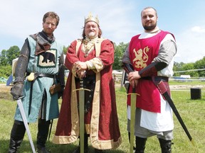 King Henry II and his loyal subjects, Sir Reginald and Sir Christopher Julien Tuck, just three of many dozens of characters who brought distinct personality and an educational touch to the Medieval Festival at Upper Canada Village, last year (2012).
File photo