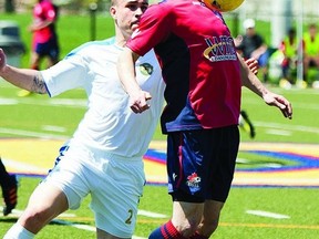 Kingston FC midfielder Catalin Lichioiu (16) redirects a pass off his chest from a teammate during the second half of the home opener against Brampton City United. Kingston defeated Brampton 6-2 in Canadian Soccer League action on May 5 at Queen’s West Campus field.        ERIC HEALY - KINGSTON THIS WEEK