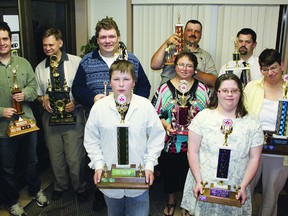 STEPHEN UHLER    Special Olympics Ontario Pembroke and Area honoured its athletes recently during their annual sports banquet. Standing in the back row are, starting from left, Joshua Mayo, most promising athlete, Dennis Blimkie, Dixie Blaedow Memorial Award, Jamie Hammel, most enthusiastic athlete, Shawn Smith, most sportsmanlike athlete, and Jeff Shand, male athlete of the year. Standing centre right are 
Gayle Cayen, most determined athlete, and Susan Therrien, who received the achievement award. In front are TJ Mullin, left, most improved athlete, and Rachael Balfour, female athlete of the year.