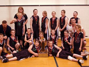 The school of Menno Simons celebrates with their trophy and gold medals following the May 11 Slam Jam Tournament held at E.E. Oliver Elementary School. Daniele Alcinii/Fairview Post