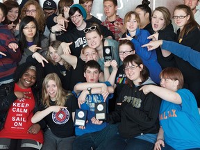 Members of the Bow Valley High School bands and choral group show off the three awards they received at the Atlantic Festival of Music.