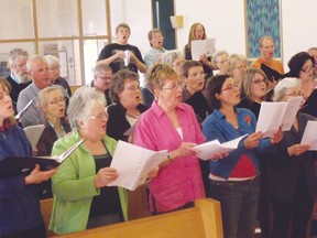 The Paisley Concert Choir, shown performing in this 2014 file photo, will present three performances early next month that pay homage to the essence of both Remembrance Day and Christmas. (Postmedia file photo)