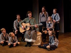Jayme Armstrong, as Maria, is surrounded by the von Trapp children during a 2012 production of "The Sound of Music." The Huron Country Playhouse will open its season with the classic musical June 4 to 22. SUBMITTED PHOTO / THE OBSERVER / QMI AGENCY