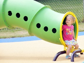 Kaylen Robitaille crawls through a caterpillar during the official opening of the Children's Treatment Centre of  Chatham-Kent's fully accessible therapy playground in Chatham, On., Wednesday May 22, 2013. DIANA MARTIN/ THE CHATHAM DAILY NEWS/ QMI AGENCY