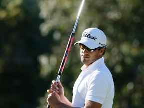 The USGA and the R & A plan a ban on anchored putters, but a group of PGA Tour players are planning to fight the ban in court. Here, tour golfer Adam Scott, who has had success with the long putter, lines up a putt. (Reuters)