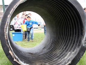 Student Nolan Ring gets ready to sprint through an obstacle course at the Timmins Children’s Water Festival at Fred Salvador Athletic Park on Wednesday. The game, called ‘Off I Go,’ was just one of many activities designed to promote the importance of water conservation for local Grade 2, 3 and 4 pupils.