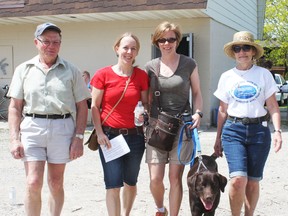 Jack Ryan and his daughters Peggy Sloan and Monica Ryan begin their hike for Huron Hospice with volunteer counsellor Norma Khan.