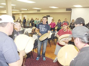 Drumming group Perfect Storm perform as conference attendees do a circle dance around the banquet room at the Best Western Wayside Inn in Wetaskiwin May 16.