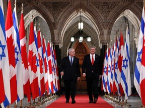 Prime Minister Stephen Harper and his Israeli counterpart, Benjamin Netanyahu, walk through Canada's Hall of Honour at the Parliament Buildings. (Postmedia Network file photo)
