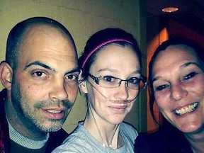 Kayla Mavretic, 23, centre, is pictured with her stepfather Mike and her mother Jennifer in this undated photo. A massive community fundraiser is in the works for Mavretic, who suffers from cystic fibrosis. SUBMITTED PHOTO / THE OBSERVER / QMI AGENCY