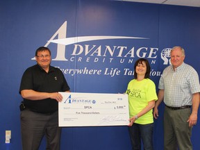 (L. to R.) Darren Fedusiak, Marianthe Strydom and Larry Sparks. Advantage Credit Union donated $5,000 to the North East SPCA.