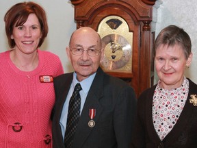 Dousithé Robichaud was awarded the prestigious Queen Elizabeth II Diamond Jubilee medal for his selfless efforts on behalf of the Golden Manor and Canadian Cancer Society. Robichaud has been shuttling seniors around the city for six years and providing much needed transportation to Sudbury for cancer patients. On hand for the presentation were, from left, Sue Walton, Robichaud and Velna Kauhala.