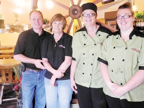 The Country Buffet and Grill is opening its doors to the community to serve a hardy dinner buffet option for local residents at the 138 Corner Plaza on the corner of the Highway 138 and Cornwall Centre Rd. The family owned and operated restaurant is serving up classic Canadian foods that are homemade.  From left are owners Brian Kennedy and Heather Paul and cooks Valerie Paul and Emily Marleau. 
Staff photo/ERIKA GLASBERG