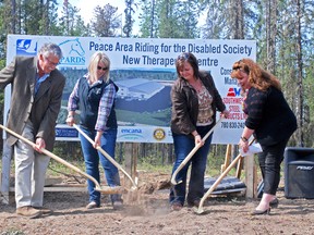 Elizabeth McSheffrey/Daily Herald-Tribune
Donors (left to right) Ken Sargent of the Ken & Teresa Sargent Family Foundation, Jaime Hebert of the Evelyn Sutherland Foundation and Leanne Beaupre of the County of Grande Prairie break ground at the future PARDS site with executive director Jennifer Douglas. The ceremony took place in 2013.