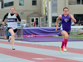 Mariah Wilson of Huron Park came second in the first preliminary heat of the Sr. girls 100-metre dash with a time of 13:19 at the WOSSAA track and field championships May 23, 2013 Thursday afternoon at TD Waterhouse Stadium in London. (GREG COLGAN/QMI Agency/Sentinel-Review)