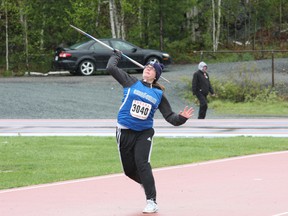 Alexie Michaud, of Ecole secondaire du Sacre-Coeur, competes in the junior girls javelin event at the high school track and field championships in Sudbury on Thursday. JOHN LAPPA/THE SUDBURY STAR/QMI AGENCY