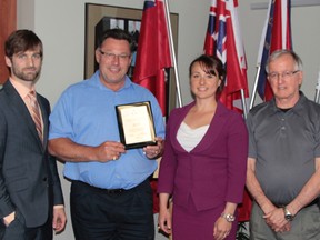 Taking part in the presentation from the Trillium Foundation this week were, from left to right, Andre Grzela of the office of Timmins – Bay MPP Gilles Bisson, kayak event co-chair and tourism manager Guy Lamarche, OTF representative Julie Gagnon-Lever and kayak event co-chair and city clerk Jack Watson.  Timmins Times LOCAL NEWS photo by Len Gillis.