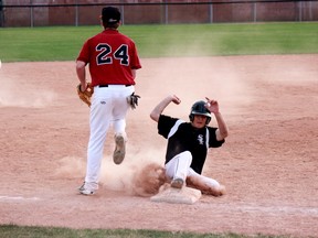 Chance Wheatley sliding into third at the May 15 Spruce Grove White Sox game against the Edmonton Cardinals. - York Underwood, Reporter/Examiner