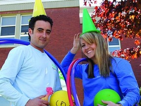 Chris Carvalho and Carolyn Faubert, Race for Kids event organizers, practice their juggling and hula hoop skills as they prepare the annual Boys and Girls Club of Kingston & Area fundraiser.   n     ROB MOOY - KINGSTON THIS WEEK