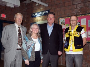 County of Brant Mayor Ron Eddy, left, Paris Museum and Historical Society president Mary Gladwin, Brant MP Phil McColeman and Paris Lions Club president Floyd McCaw celebrate the announcement of more than $50,000 in federal funding to make more accessible the museum's entrance, the county's website and a ramp to Lions Park. MICHAEL PEELING/The Paris Star/QMI Agency