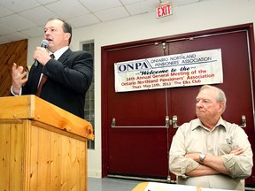 George Payne, chairman of the Ontario Northland Pensioners' Association, looked on as North Bay Mayor Al McDonald told seniors the best protection for their pensions is to keep the Ontario Northland Transportation Commission, including Ontera, in public hands, Thursday at the Elks Club. (MARIA CALABRESE The Nugget)