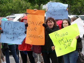 Physiotherapists who work in Kingston area seniors homes picket outside the Woolen Mill after visiting Kingston and the Islands MPP John Gerretsen's downtown office on Friday. The group is protesting Ontario government cuts to physiotherapy services in seniors homes.
Ian MacAlpine The Whig-Standard