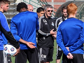 Head coach Colin Miller (centre right in black) takes part in an FC Edmonton practice at Clarke Stadium, in Edmonton, Alta. on Friday May 17, 2013. The team takes on the Ft. Lauderdale Strikers at Clarke Stadium May 26. David Bloom/Edmonto