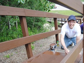 Pastor Dallas Biddell, of the Whitecourt Family Centre, helps paint the stairs in Memorial Park as part of last year’s Love Whitecourt Day. Many of the churches in Whitecourt have teamed up to do various good deeds around Whitecourt to show how much God loves his people.
Barry Kerton | Whitecourt Star