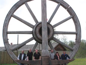 From left to right: Woodlands County Coun. Dale McQueen, Coun. Darryl Yagos, Mayor Jim Rennie, Coun. Chad Merrifield, Heather Anderson (Economic Development Officer / Icons Project Coordinator), Coun. Al Deane gathered at the Fort Assiniboine icon, the world’s largest wagon wheel and pick, May 21, to commemorate the awards the Alberta Icons program has garnered this year.
Celia Ste Croix | Whitecourt Star