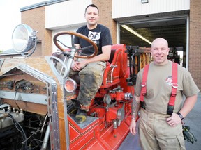 SARAH DOKTOR Simcoe Reformer
Mike Lefler, treasurer and secretary of the Simcoe Firefighters Association and Mike Tatarka, president of the association show off the 1936 Bickle Chieftain. Maintaining the vintage truck is one of the many responsibilities of the Simcoe Firefighters Association.