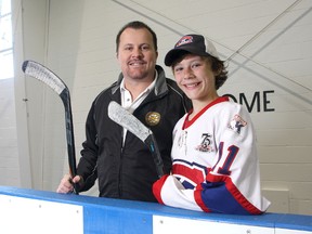 Kingston hockey coach and hockey school instructor Jeff Fletcher at the Invista Centre with his son Tyson, a minor hockey player for the Kingston Canadians. Jeff Fletcher agrees with Hockey Canada’s decision to ban bodychecking at the peewee level. (Ian MacAlpine/The Whig-Standard)