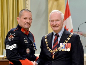 Governor General David Johnston presented North Bay Police Service Sgt. Mike Hunter with the Order of Merit of the Police Forces during a ceremony at Rideau Hall on Friday. (SUBMITTED PHOTO)