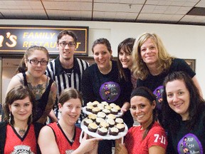 The Plap City Rollers roller derby team held a bake and craft sale at the Portage Mall, Saturday, that raised over $300 for the group. Back l-r: Tina Jansen (Girlmeat), Lindsay Burch (Lurch), Melissa McDonald (Amelia Airbourne), Janet Musters, Karen Enns (KJ Karnage). Front l-r: Jenny Sandney (Eddy Nigma), Robin Dudgeon (Dalliah Doomsayer), Jenn Bach (Lynn Detta), and Lisa Tessier (Tess the Mess). (SVJETLANA MLINAREVIC/PORTAGE DAILY GRAPHIC/QMI AGENCY)