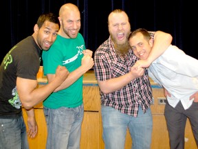 Wrestlers of Smash Wrestling spoke to students at Huron Heights Public School on May 22, 2013. L-R: Alex Vega, Sebastian Suave and John Greed wrestle with teacher Rob Macleod. The group went on to speak at Kincardine Township Tiverton Public School. (ALANNA RICE/KINCARDINE NEWS)