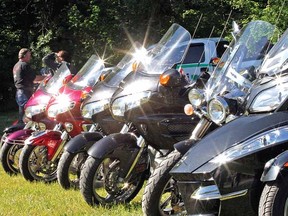 With hundreds of motorcycles lined up at the Milt Dunnell Fields in St. Marys at the end of Saturday's Forbidden Ride through Perth County, there were plenty of glass and chrome surfaces for the sun to cast a blinding glare. (MIKE BEITZ, The Beacon Herald)