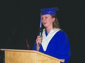 Valedictorian Kimberley Hort delivers her address to her fellow graduates at the May 25 ceremony.