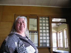 City heritage planning co-ordinator Sandra Parks at the ticket wicket in old CPR station. Both city train stations are on this weekend's Open Doors tour of heritage buildings and places.