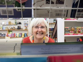 Suzanne Brooks, co-owner of Gulliver's Quality Books and Toys, is shown at the store Monday as she prepares for a sale leading up to her retirement at the end of June after 27 years in the business. (MARIA CALABRESE The Nugget)