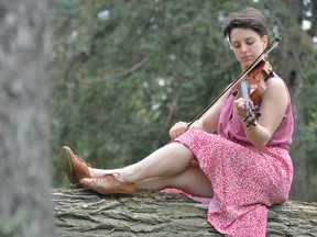 Twenty-eight-year-old Toronto actor Anna Atkinson, who plays the fiddler in the Stratford Festival’s production of Fiddler on the Roof, comes from a musical family and plays eight instruments. (SCOTT WISHART, QMI Agency)