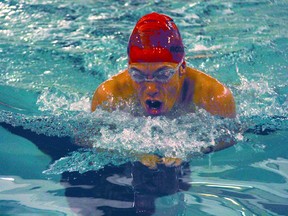 Representing the Deep River Candus, Liam Rodgers powers through the pool during the 100-metre breast stroke. The Deep River Candu Swim Club recently hosted the annual Blackfly Meet.