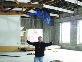 Bruce Davis stands in the shell of the historic Bell Tower building that he hopes will become the home of the Gananoque Brewing Company.    Wayne Lowrie - Gananoque Reporter
