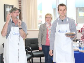 (L to R) Don Tyacke and Zack Moskal were part of a pie auction for the Relay For Life 2013 at the Advantage Credit Union in Melfort on Friday, May 24.