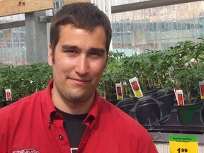 Pierre Touchette, garden centre manager at Canadian Tire in Portage la Prairie, stands near a large selection of tomato transplants to suit every gardener’s need from cherry size to large slicers. (TED MESEYTON/SUBMITTED PHOTO)
